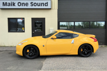 Black 2008 Nissan 350Z sports car with professional window tint
